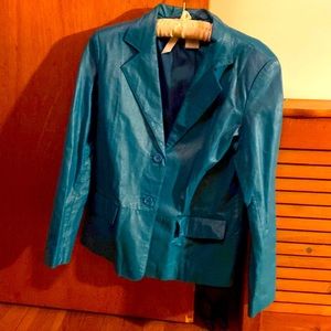 Teal button front 100% leather jacket. Front pockets.